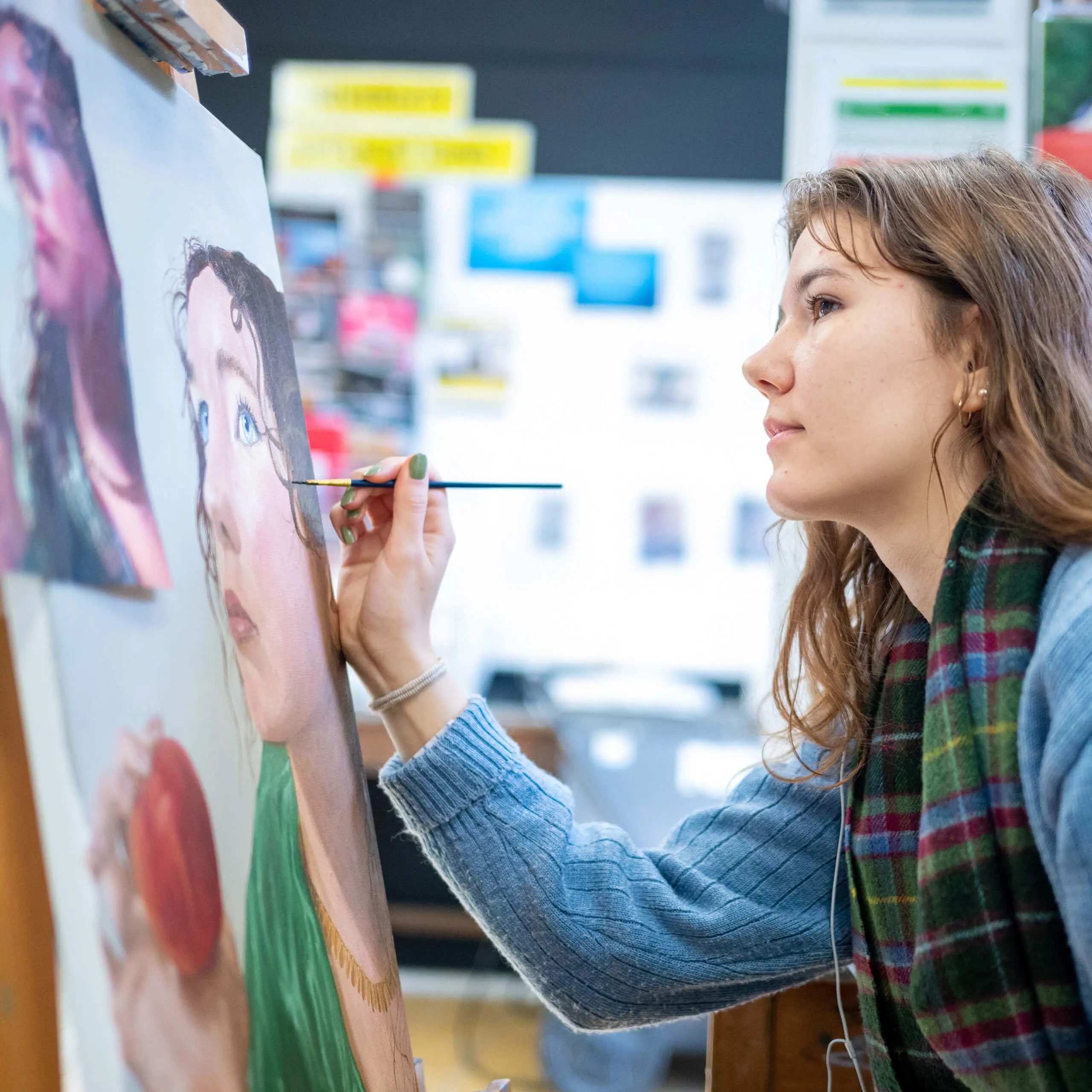 Gordonstoun pupil painting a portrait in an Art lesson