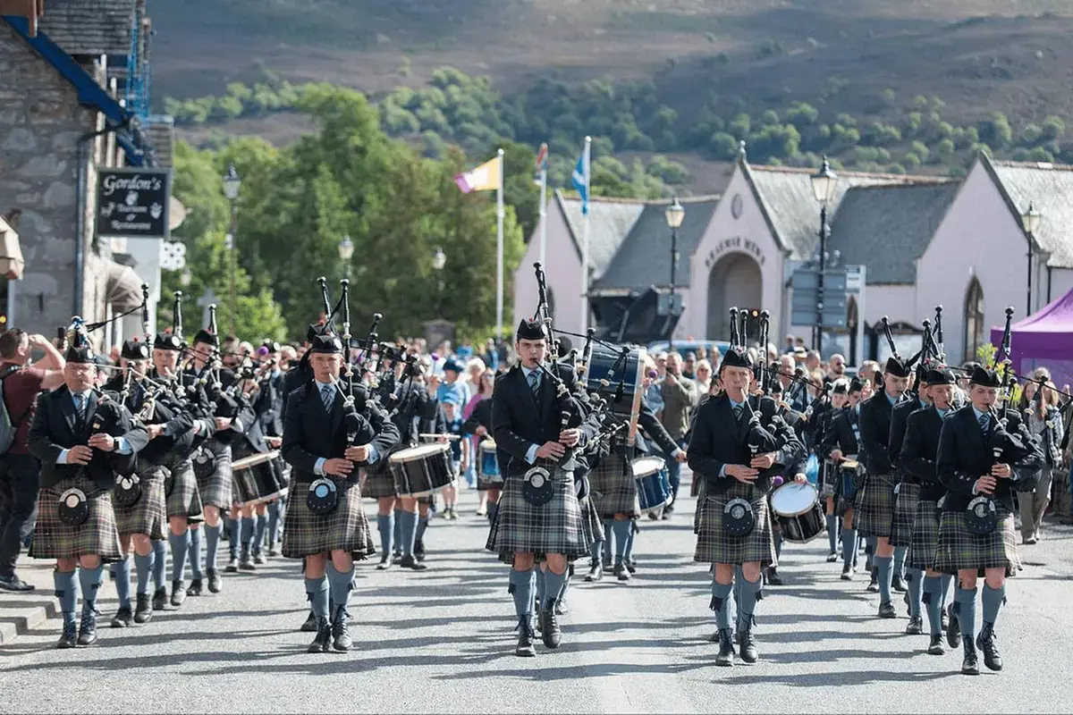 Gordonstoun Pipe Band marching at Braemar Gathering