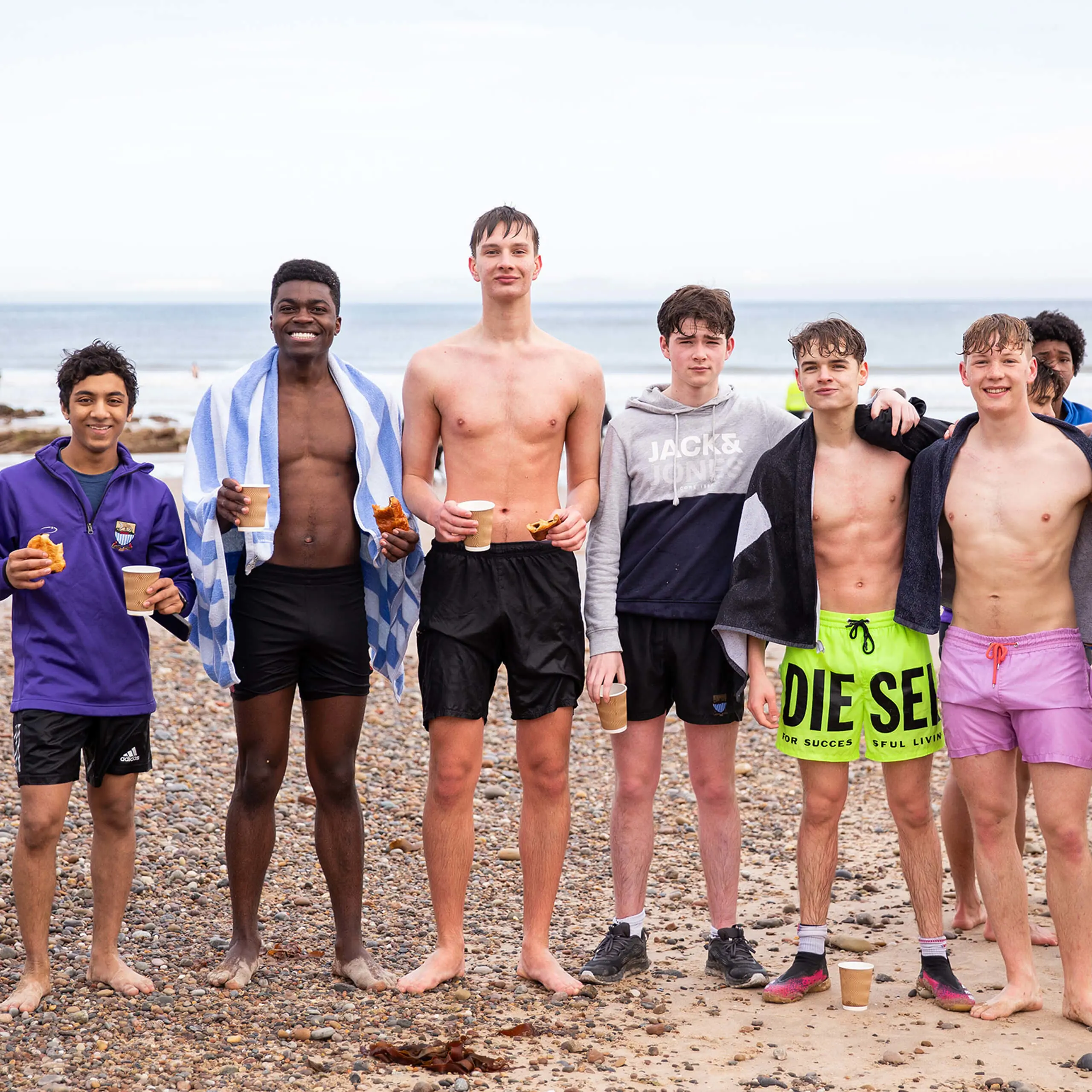 Senior pupils enjoying free time at the beach