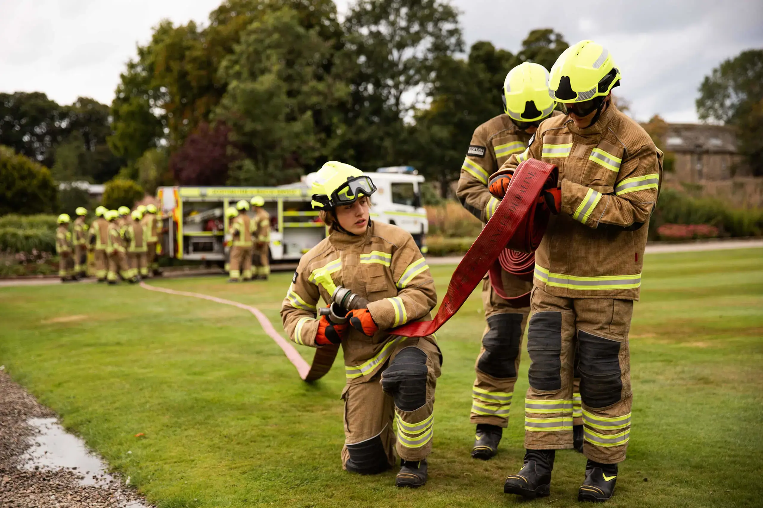 Gordonstoun Fire Service rolling out fire hoses on the South lawn in front of Gordonstoun House