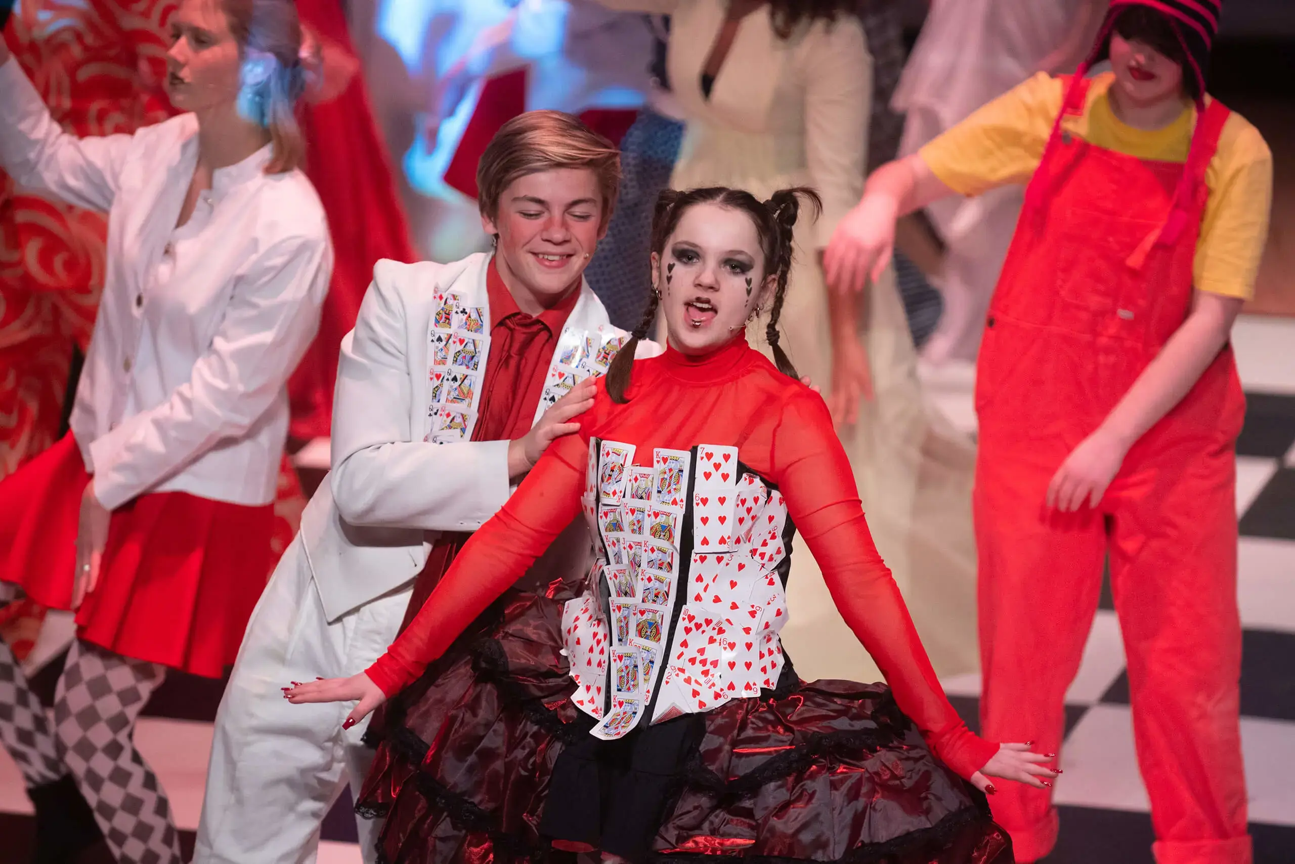 A Gordonstoun student plays The Queen of Hearts in the production of Alice on stage in Gordonstoun’s theatre