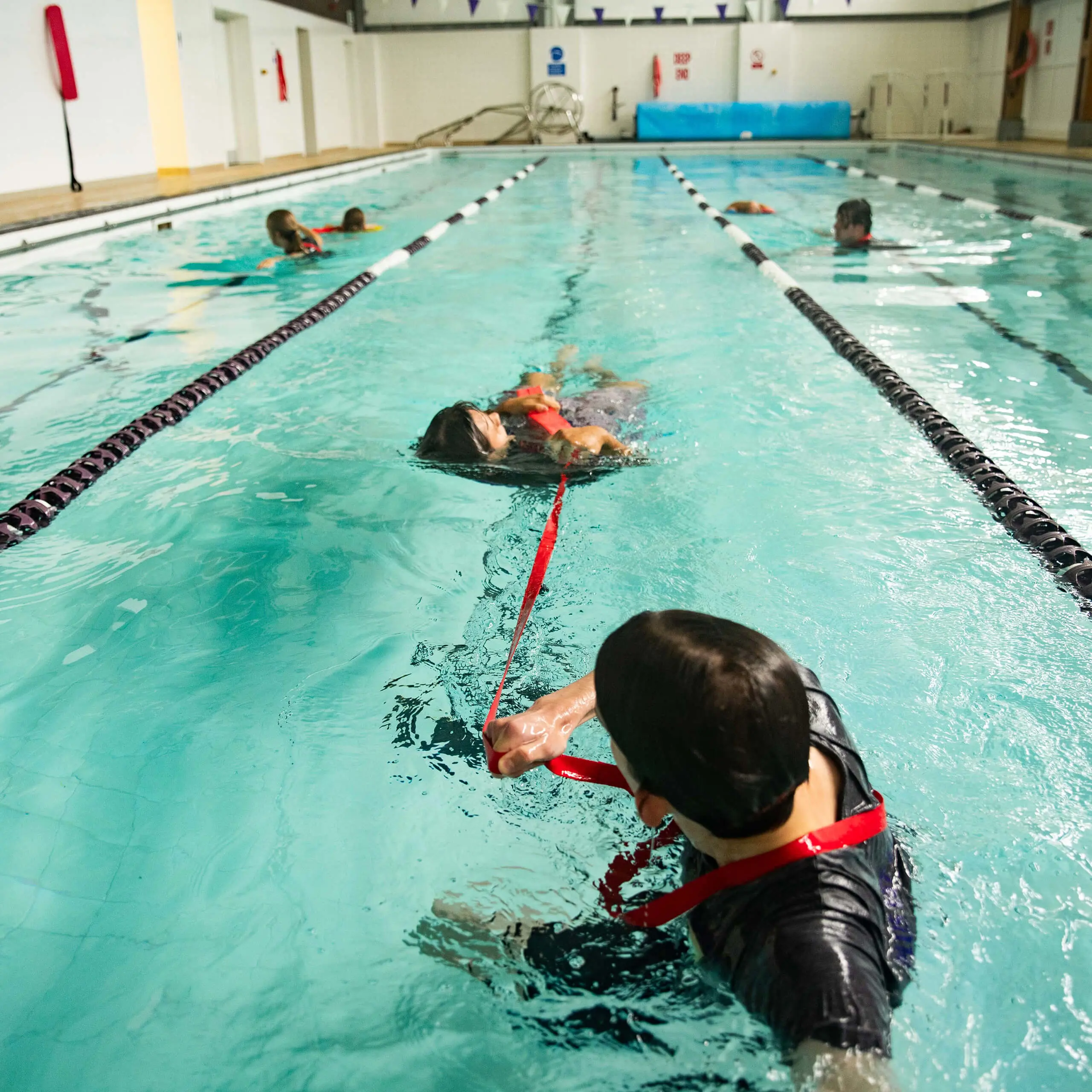 Student members of Gordonstoun's Pool Lifeguards Service training.