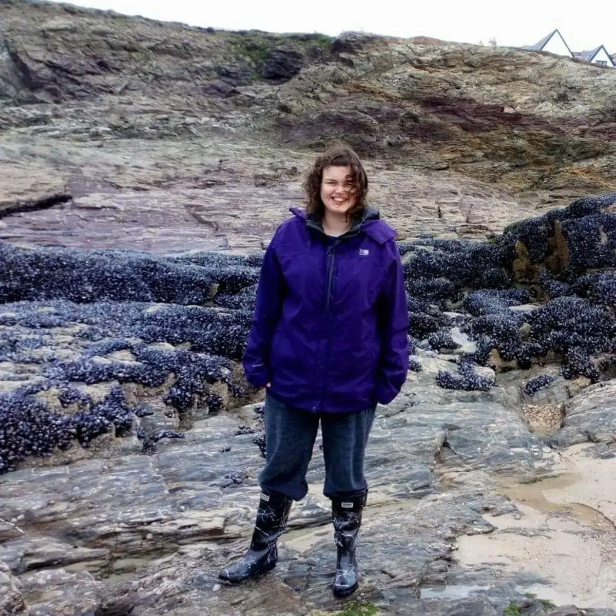 Vicki Medina on a Rocky Seaside