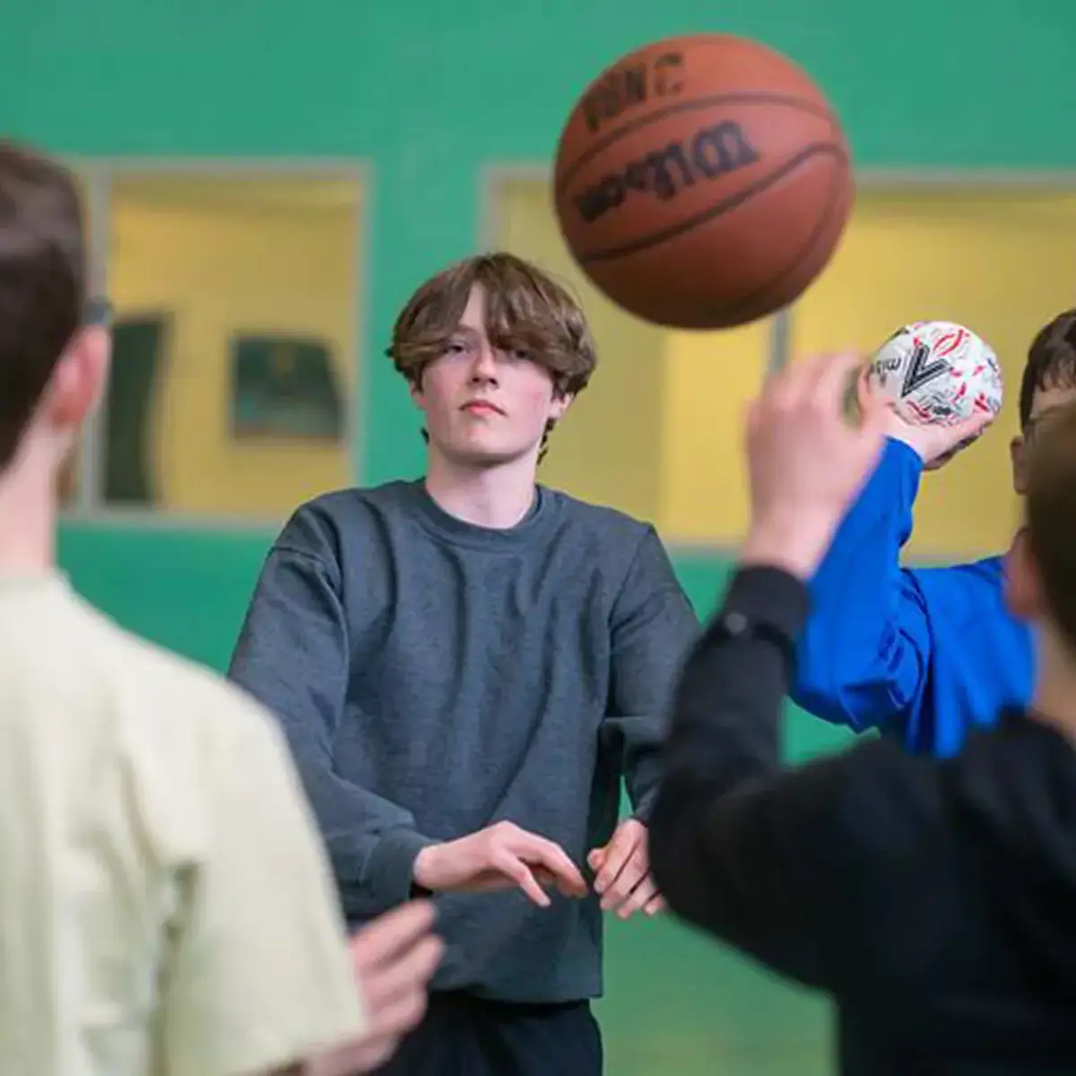 Students Playing Basketball