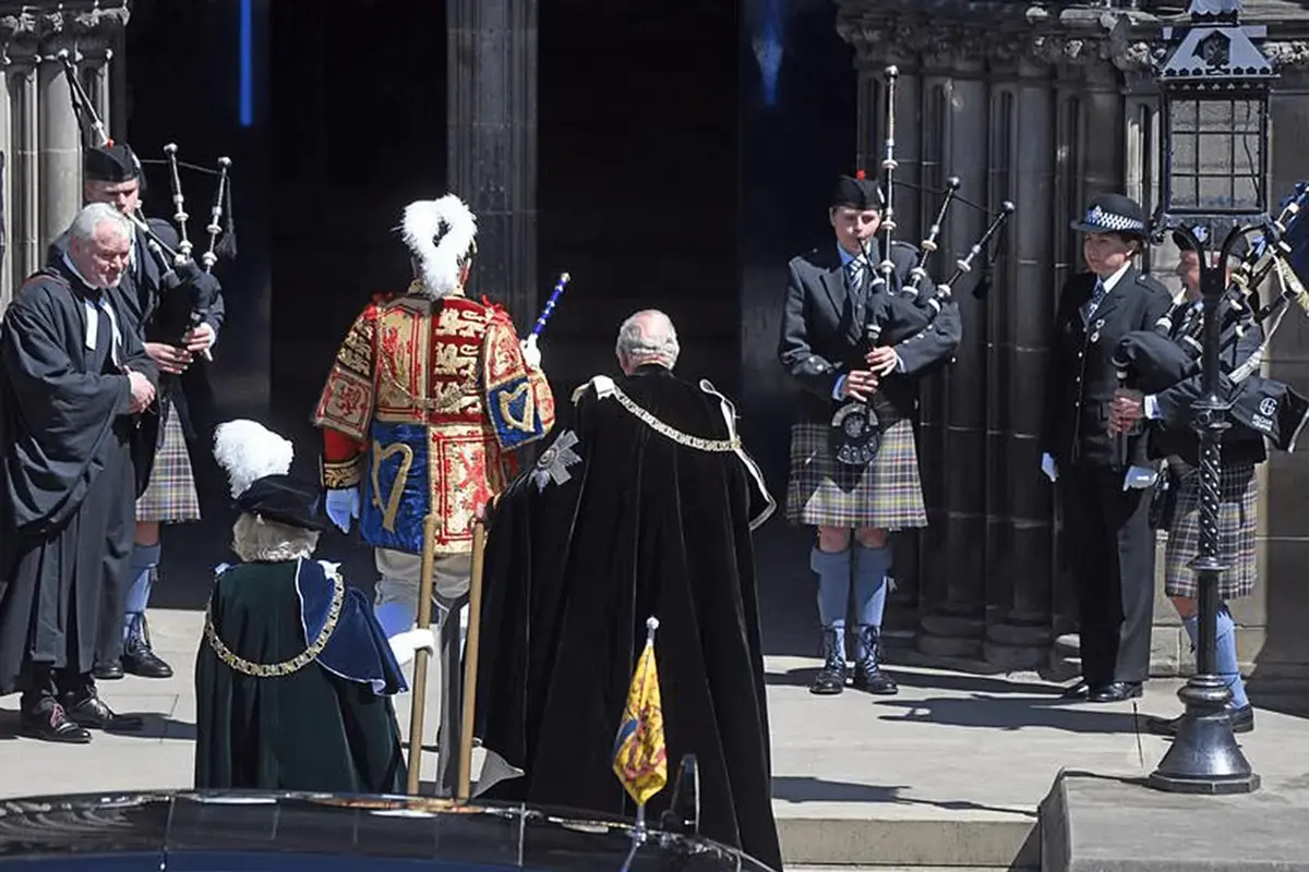 Kings Coronation Surrounded By Bagpipe Players