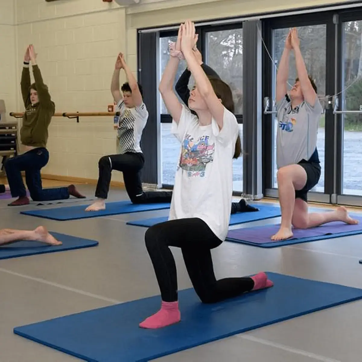 Students Doing Yoga as Part of Active Revision